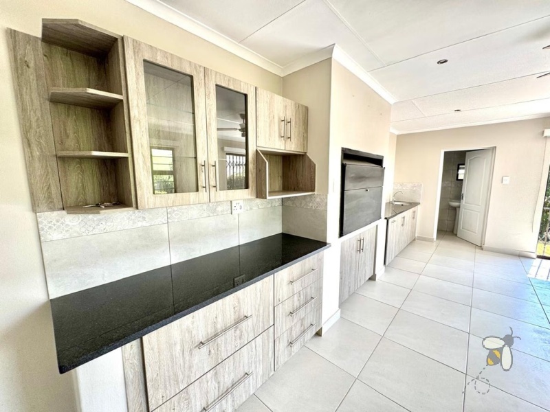 Secunda, 4 bedroom house for sale, newly renovated, green area, indoor entertainment, built-in braai, granite counters, fireplace, outside room, guest suite, double garage, prime location.