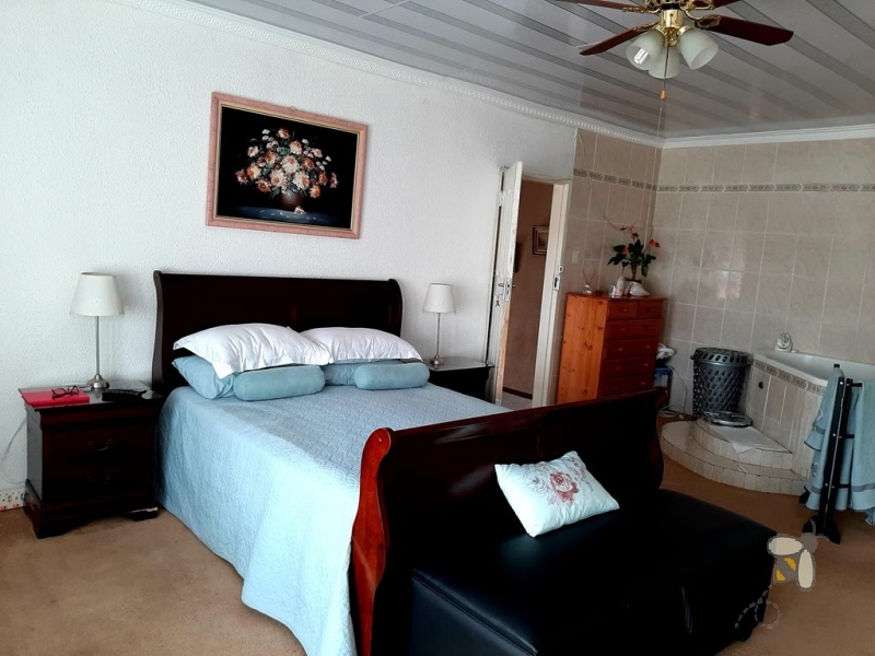 Secunda, 6 bedroom house for sale, prime location, luxurious home, guest house potential, corner stand, two entrances, granite kitchen, indoor lapa, built-in braai, large family home.