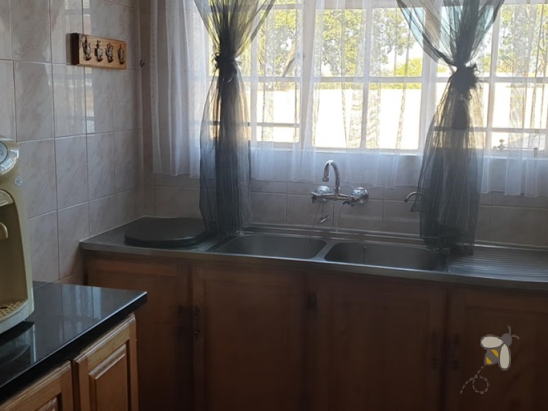 Standerton Central, 3 bedroom freehold for sale, modern home, move-in ready, gas fireplace, JoJo tank, gas stove, electric fence, heated bathrooms, secure parking, town access.