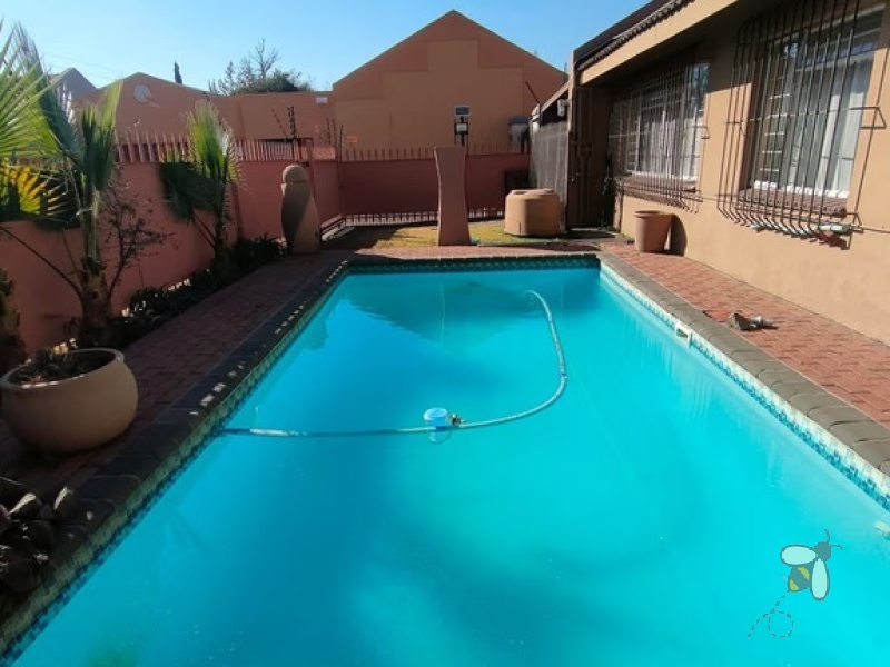 Secunda, 4 bedroom house for sale, family home, investor property, swimming pool, indoor braai, gas braai, bar area, double garage, strong rental potential, Mpumalanga.