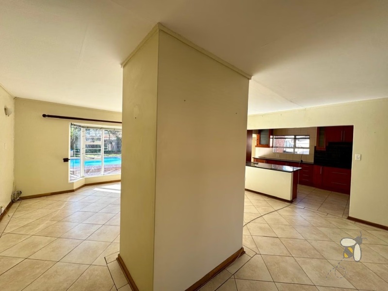 Secunda, 4 bedroom house for sale, spacious home, prime location, High School Secunda, swimming pool, built-in braai, granite countertops, parquet flooring, automated carport, low maintenance.