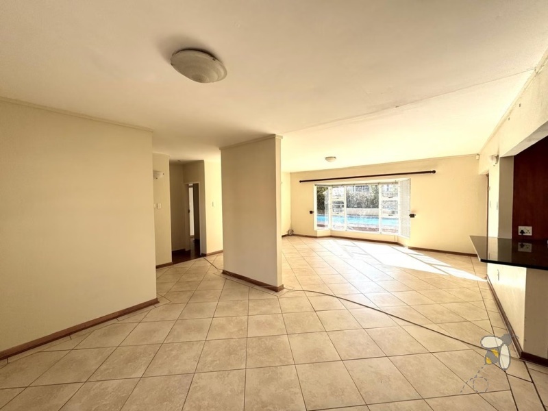 Secunda, 4 bedroom house for sale, spacious home, prime location, High School Secunda, swimming pool, built-in braai, granite countertops, parquet flooring, automated carport, low maintenance.