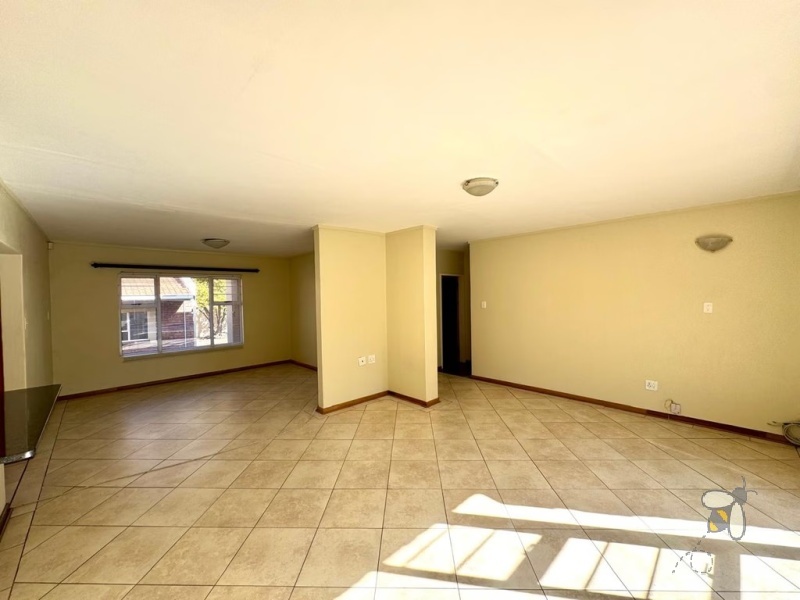 Secunda, 4 bedroom house for sale, spacious home, prime location, High School Secunda, swimming pool, built-in braai, granite countertops, parquet flooring, automated carport, low maintenance.
