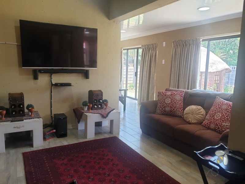 Standerton Central, 3 bedroom house for sale, modernized home, dual braai areas, entertainment area, open plan living, inverter, JoJo tank, single garage, carport for 4, luxurious living.