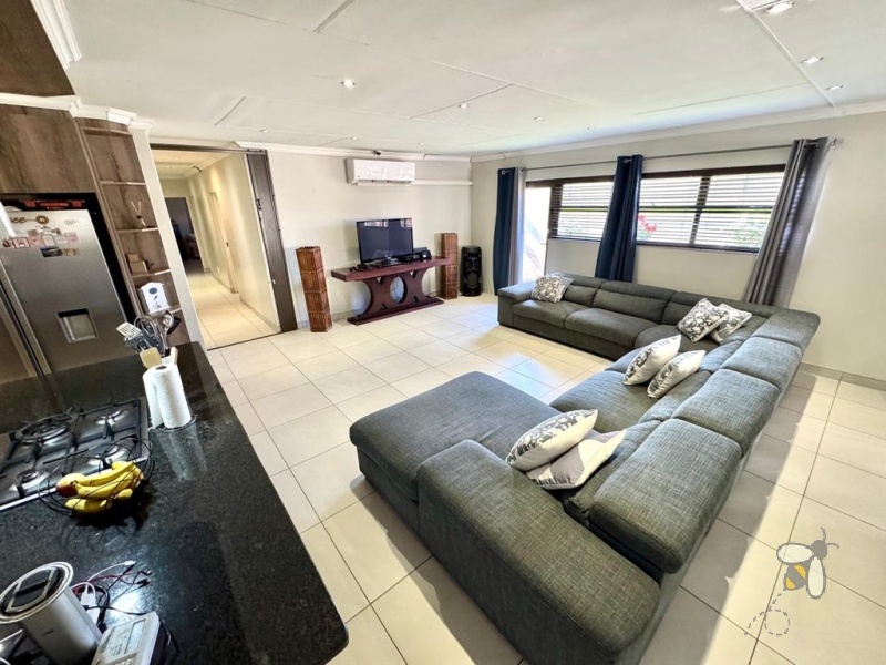 Secunda, 4 bedroom house for sale, modern comfort, walk-in wardrobe, gas hob, scullery, built-in braai, swimming pool, inverter system, JoJo tanks, multi-use room, smart investment.