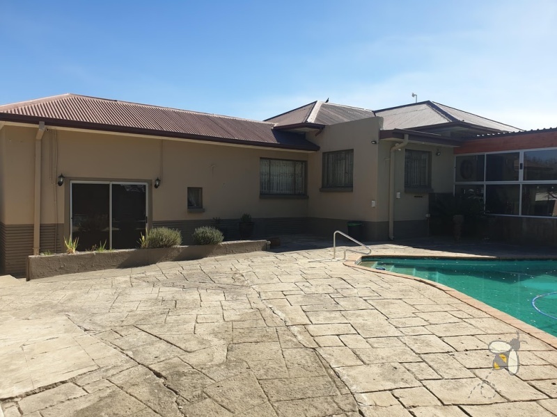 Standerton Central, business from home, commercial potential, dual entrances, CBD walking distance, 3 bedroom house, bachelor flat, swimming pool, high security, double garage, investment.