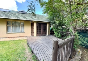 Secunda, 4 bedroom house for sale, prime location, top schools, indoor jacuzzi, built-in braai, gas hob, granite countertops, exposed wooden beams, fireplace, three garages, dual entrances.