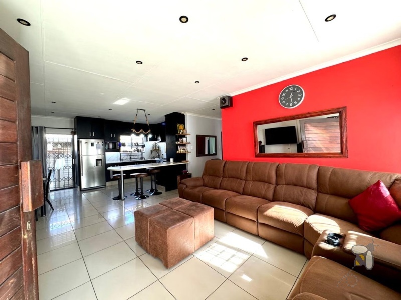 Secunda, 3 bedroom house for sale, modern family home, Caesarstone, gas hob, swimming pool, inverter system, JoJo tank, dual braai, double garage, open plan living, tiled throughout.
