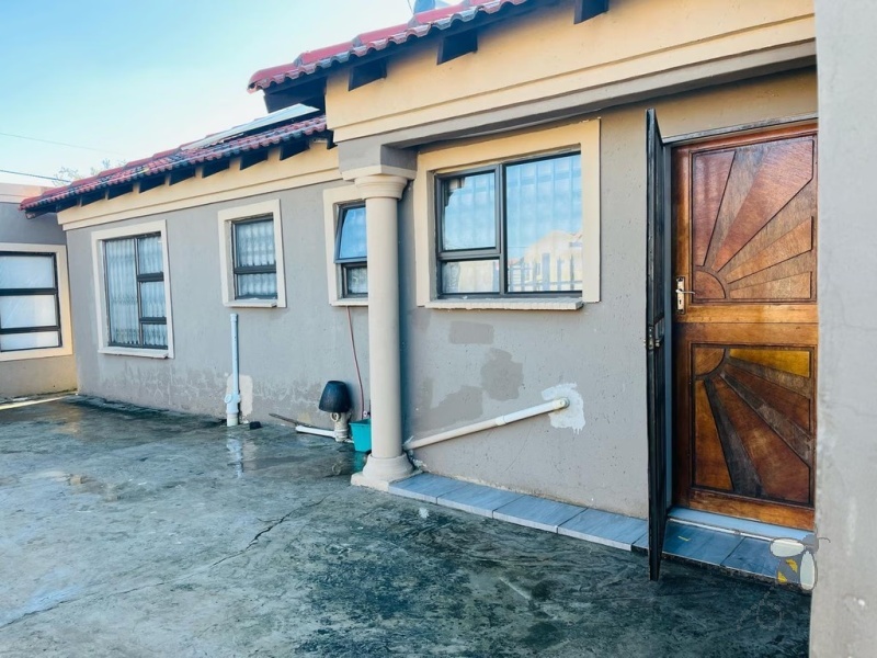 Embalenhle, 3 bedroom house for sale, modern home, solar power, inverter system, solar geyser, outside rooms, rental income, double garage, high security, freehold.