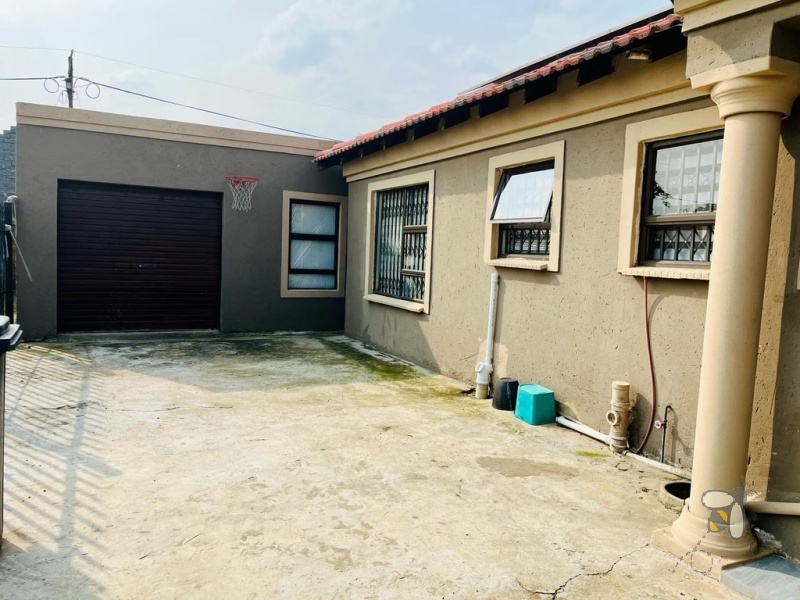 Embalenhle, 3 bedroom house for sale, modern home, solar power, inverter system, solar geyser, outside rooms, rental income, double garage, high security, freehold.