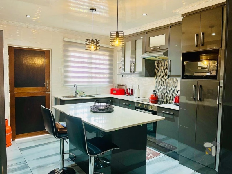 Embalenhle, 3 bedroom house for sale, modern home, solar power, inverter system, solar geyser, outside rooms, rental income, double garage, high security, freehold.
