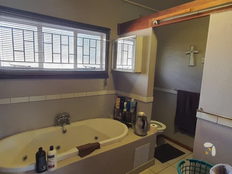 Standerton Central, 3 bedroom house for sale, prime location, near high school, sports grounds, flatlet, rental income, gas stove, fireplace, spa bath, double garage, move-in ready.