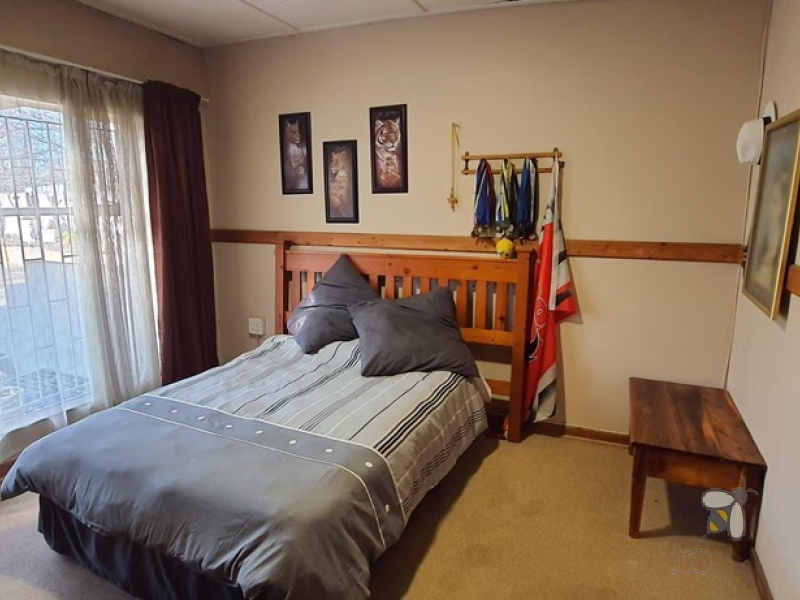 Standerton Central, 3 bedroom house for sale, prime location, near high school, sports grounds, flatlet, rental income, gas stove, fireplace, spa bath, double garage, move-in ready.