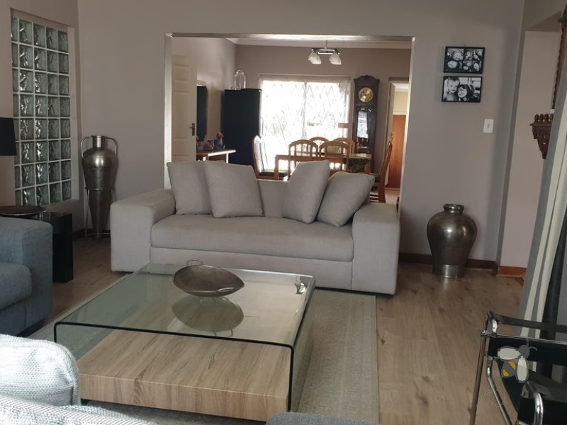 Standerton Central, 4 bedroom house for sale, business rights, flatlet potential, swimming pool, lapa, anthracite fireplace, JoJo tank, double garage, laminated floors, close to town.