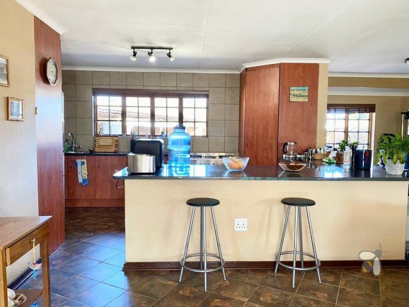 Secunda, 3 bedroom house for sale, good location, near schools, shopping centre, open plan living, granite tops, ELBA stove, fireplace, sparkling pool, built-in braai, double garage.