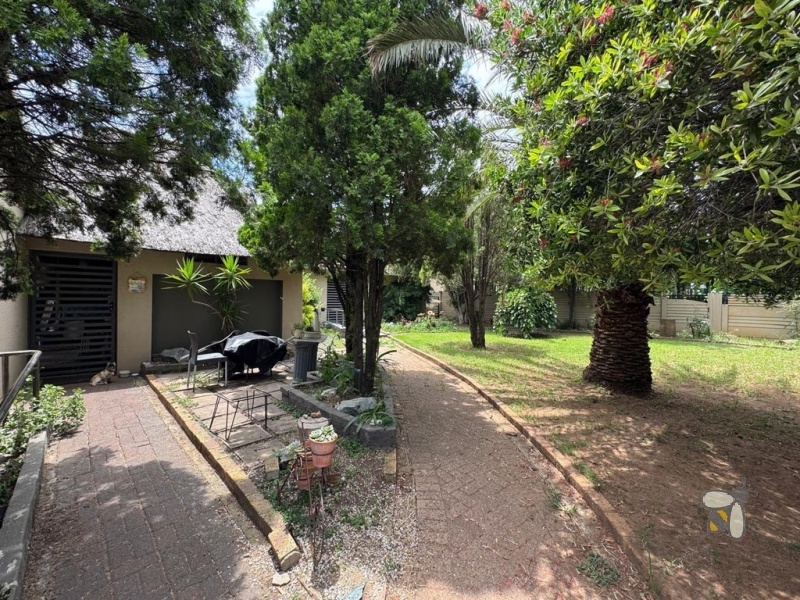 Secunda, 4 bedroom house for sale, central location, three living areas, swimming pool, lapa, built-in braai, single garage, double carport, family home, close to schools.