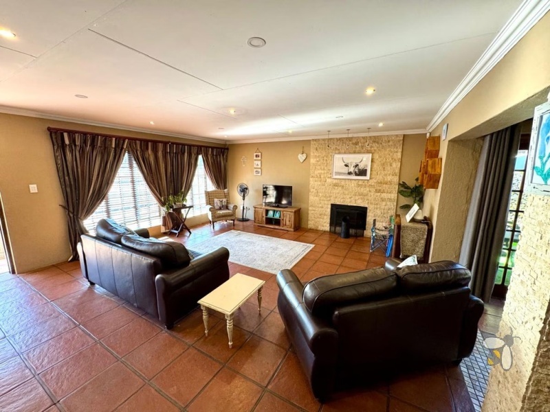 Secunda, Tuscan style home, 3 bedroom house for sale, indoor braai, fireplace, SMEG stove, granite countertops, jet bath, jacuzzi, double garage, scullery, private garden.
