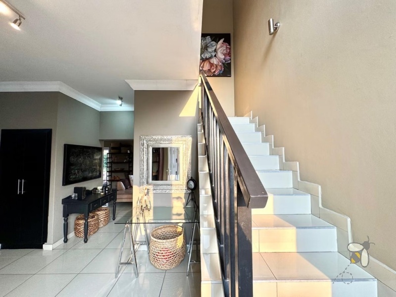 Secunda, modern home, low maintenance, 3 bedroom house for sale, Caesarstone, ELBA gas hob, pajama lounge, boma, JoJo tank, double garage, lock-up-and-go.