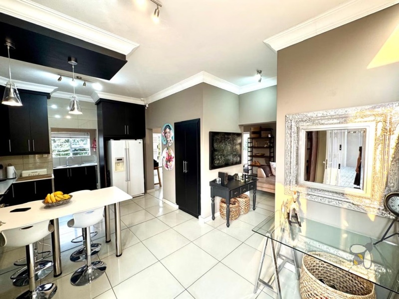 Secunda, modern home, low maintenance, 3 bedroom house for sale, Caesarstone, ELBA gas hob, pajama lounge, boma, JoJo tank, double garage, lock-up-and-go.