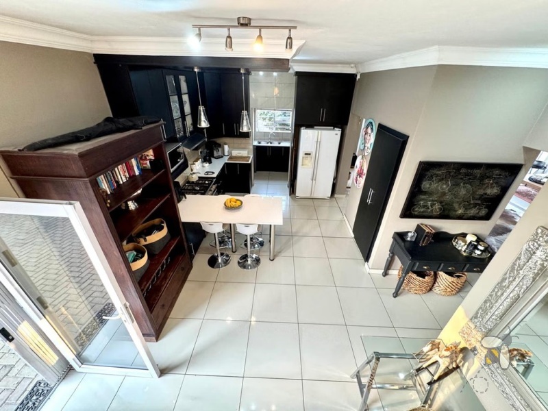 Secunda, modern home, low maintenance, 3 bedroom house for sale, Caesarstone, ELBA gas hob, pajama lounge, boma, JoJo tank, double garage, lock-up-and-go.