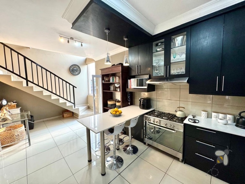 Secunda, modern home, low maintenance, 3 bedroom house for sale, Caesarstone, ELBA gas hob, pajama lounge, boma, JoJo tank, double garage, lock-up-and-go.
