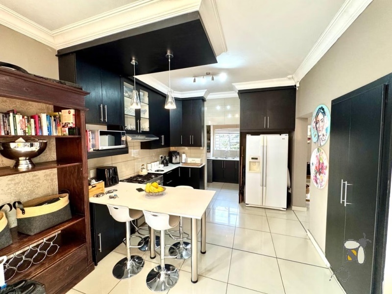 Secunda, modern home, low maintenance, 3 bedroom house for sale, Caesarstone, ELBA gas hob, pajama lounge, boma, JoJo tank, double garage, lock-up-and-go.