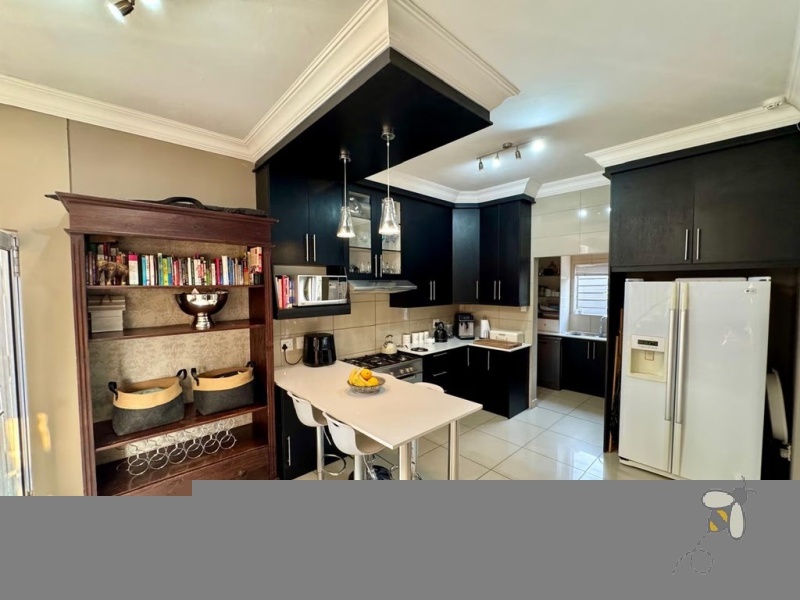 Secunda, modern home, low maintenance, 3 bedroom house for sale, Caesarstone, ELBA gas hob, pajama lounge, boma, JoJo tank, double garage, lock-up-and-go.