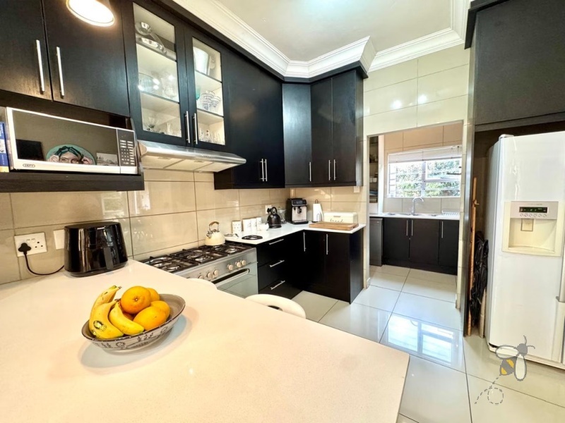 Secunda, modern home, low maintenance, 3 bedroom house for sale, Caesarstone, ELBA gas hob, pajama lounge, boma, JoJo tank, double garage, lock-up-and-go.