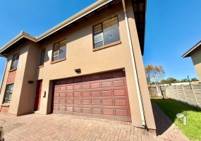 Secunda, ultra-modern home, double-storey, 3 bedroom house for sale, swimming pool, gas stove, built-in braai, sleek design, study area, motorized double garage, stylish living.