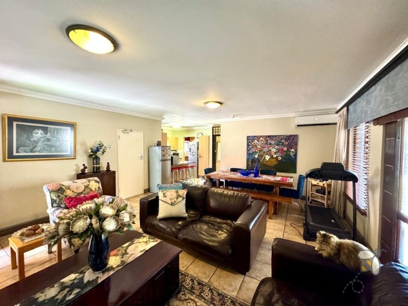 Secunda complex, modern living, 3 bedroom house for sale, solar inverter system, JoJo water tank, granite countertops, enclosed patio, scullery, double garage, sought-after location.