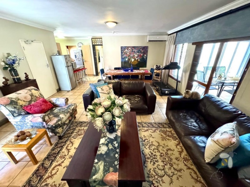 Secunda complex, modern living, 3 bedroom house for sale, solar inverter system, JoJo water tank, granite countertops, enclosed patio, scullery, double garage, sought-after location.