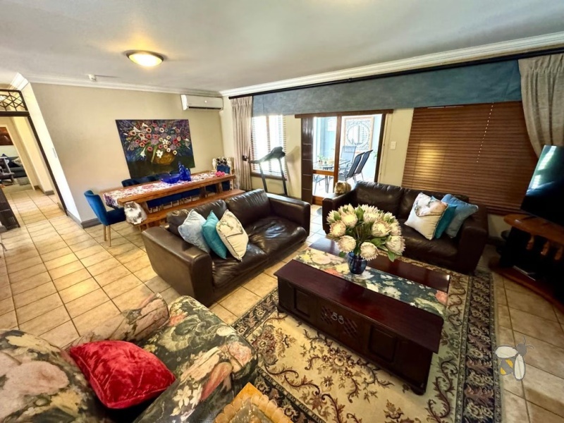 Secunda complex, modern living, 3 bedroom house for sale, solar inverter system, JoJo water tank, granite countertops, enclosed patio, scullery, double garage, sought-after location.