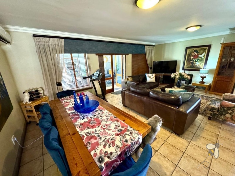 Secunda complex, modern living, 3 bedroom house for sale, solar inverter system, JoJo water tank, granite countertops, enclosed patio, scullery, double garage, sought-after location.