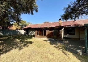 Secunda Central, 6 bedroom house for sale, two houses, dual living, investment property, rental income, corner stand, private yard, sunlit braai area, versatility.