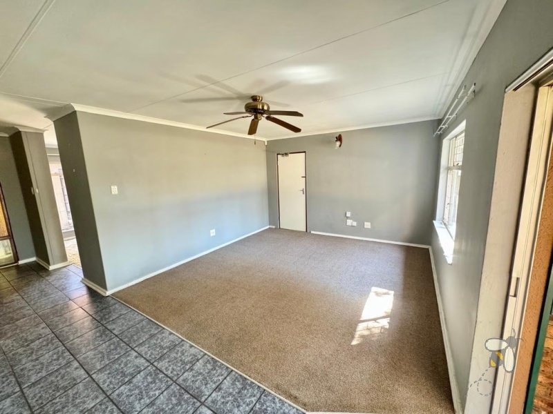 Secunda Central, 6 bedroom house for sale, two houses, dual living, investment property, rental income, corner stand, private yard, sunlit braai area, versatility.