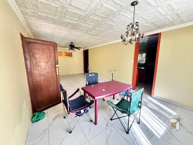 Secunda, 4 bedroom family home, open plan living, double garage, double carport, spacious yard, outside room, staff accommodation, versatile home.