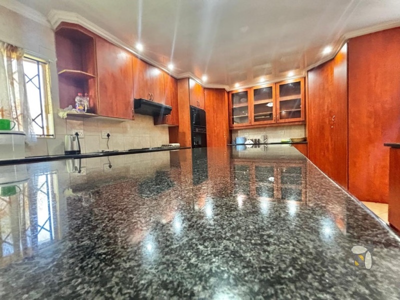 Secunda, 4 bedroom family home, open plan living, double garage, double carport, spacious yard, outside room, staff accommodation, versatile home.