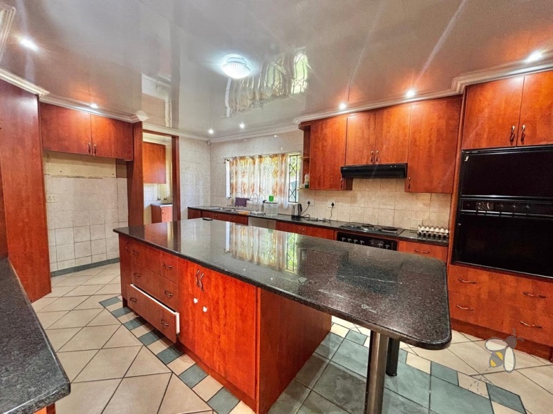 Secunda, 4 bedroom family home, open plan living, double garage, double carport, spacious yard, outside room, staff accommodation, versatile home.