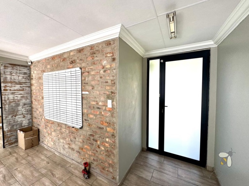 Secunda, versatile property, 4 bedroom house for sale, office space potential, opposite school, Caesarstone, borehole, inverter backup, built-in braai, granny flat potential, double garage.