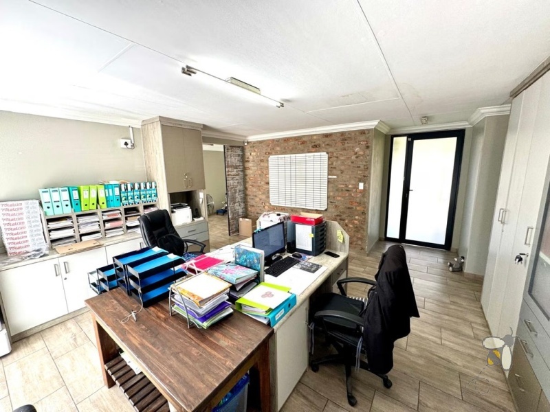 Secunda, versatile property, 4 bedroom house for sale, office space potential, opposite school, Caesarstone, borehole, inverter backup, built-in braai, granny flat potential, double garage.