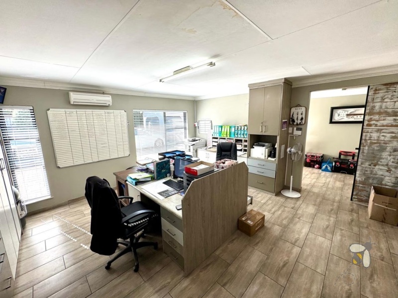 Secunda, versatile property, 4 bedroom house for sale, office space potential, opposite school, Caesarstone, borehole, inverter backup, built-in braai, granny flat potential, double garage.