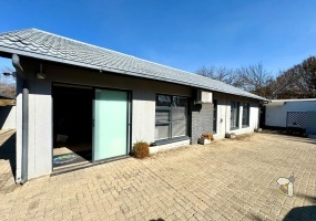 Secunda, versatile property, 4 bedroom house for sale, office space potential, opposite school, Caesarstone, borehole, inverter backup, built-in braai, granny flat potential, double garage.