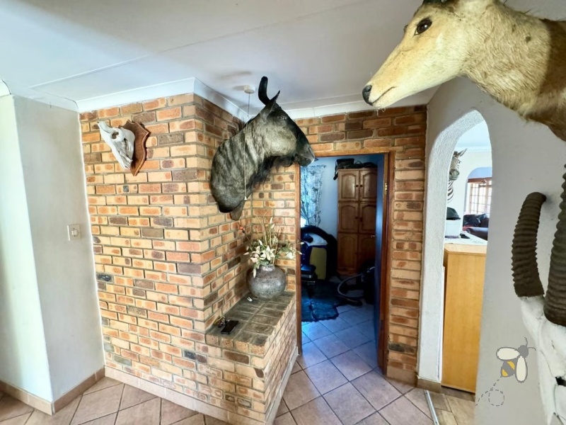 Secunda, 3 bedroom house for sale, 1 bedroom flat, rental income, self-contained flat, solid oak kitchen, granite countertops, Jetmaster fireplace, built-in braai, tandem garage.