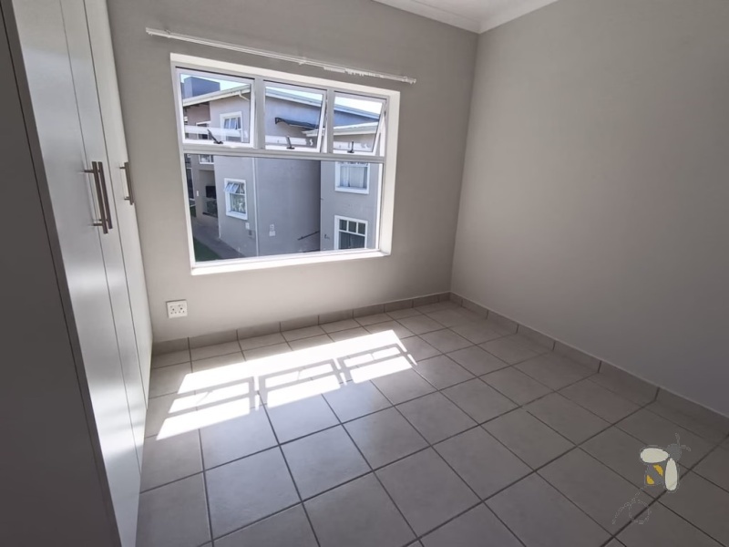 Island View Mossel Bay, Olive Ridge, 2 bedroom apartment for sale, first floor apartment, enclosed braai, lock-up garage, pet friendly, fibre ready, investment property.