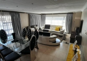 Secunda, 3 bedroom house for sale, well-developed area, open plan living, indoor fireplace, downlights, double garage, ample parking, enhanced security, family home.