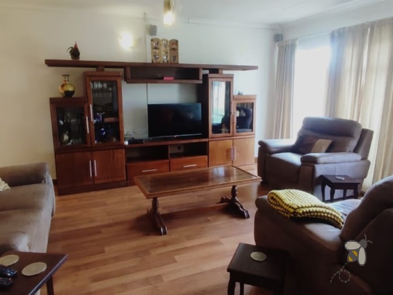 Secunda, 4 bedroom house for sale, secure area, solar panels, JoJo tank, built-in braai, large garden, modern kitchen, family home, sustainable living.