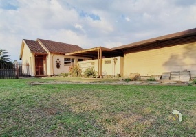 Secunda, 4 bedroom house for sale, secure area, solar panels, JoJo tank, built-in braai, large garden, modern kitchen, family home, sustainable living.