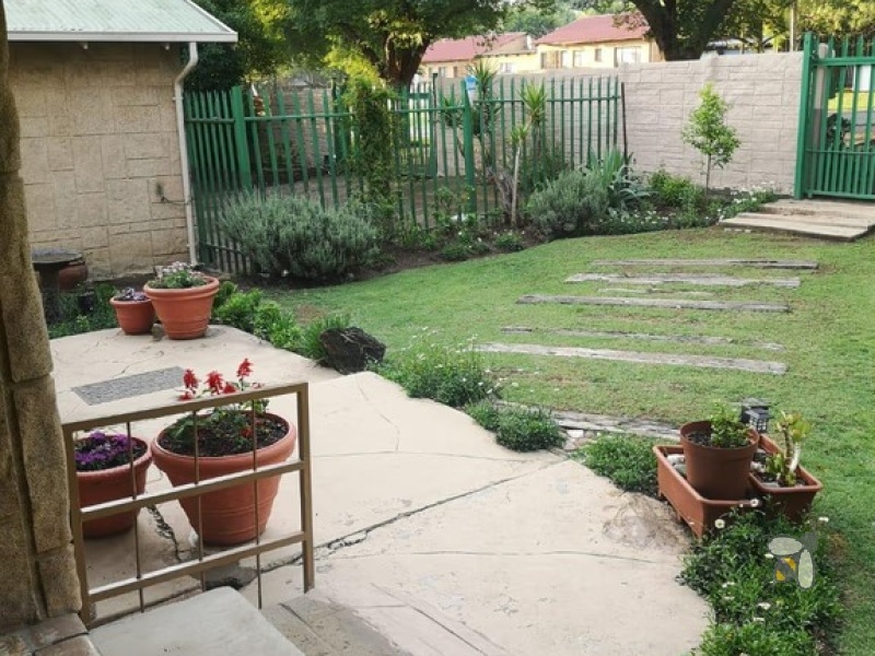 Standerton Central, 3 bedroom house for sale, convenient location, income potential, separate flat, double garage, walk-in closet, outside storage buildings, family home, investors.