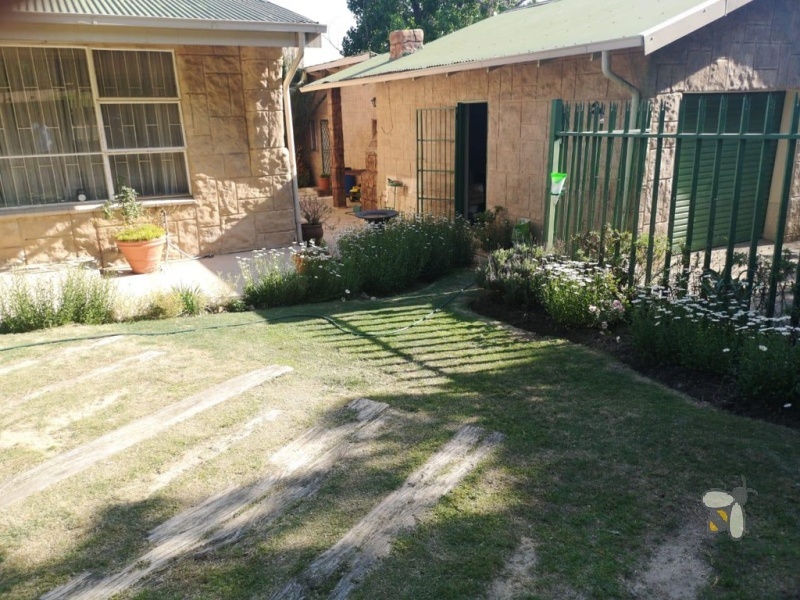 Standerton Central, 3 bedroom house for sale, convenient location, income potential, separate flat, double garage, walk-in closet, outside storage buildings, family home, investors.