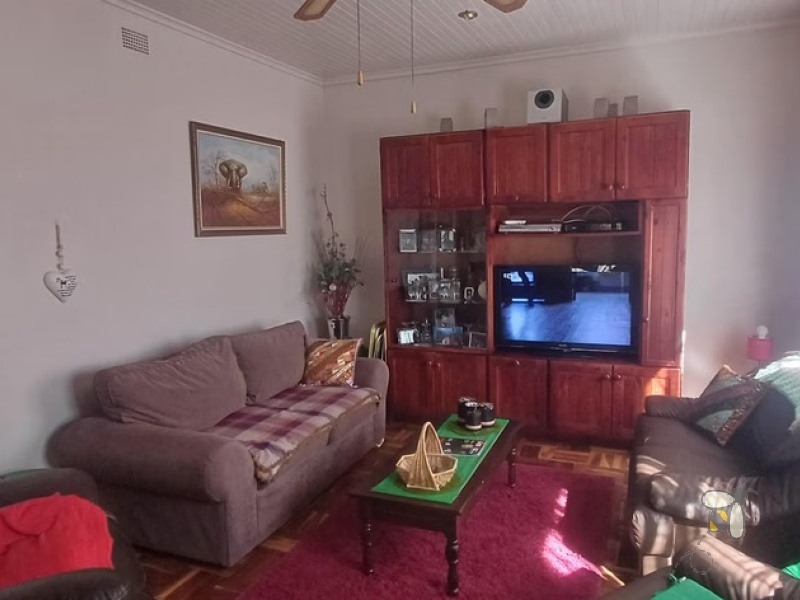 Standerton Central, 3 bedroom house for sale, convenient location, income potential, separate flat, double garage, walk-in closet, outside storage buildings, family home, investors.